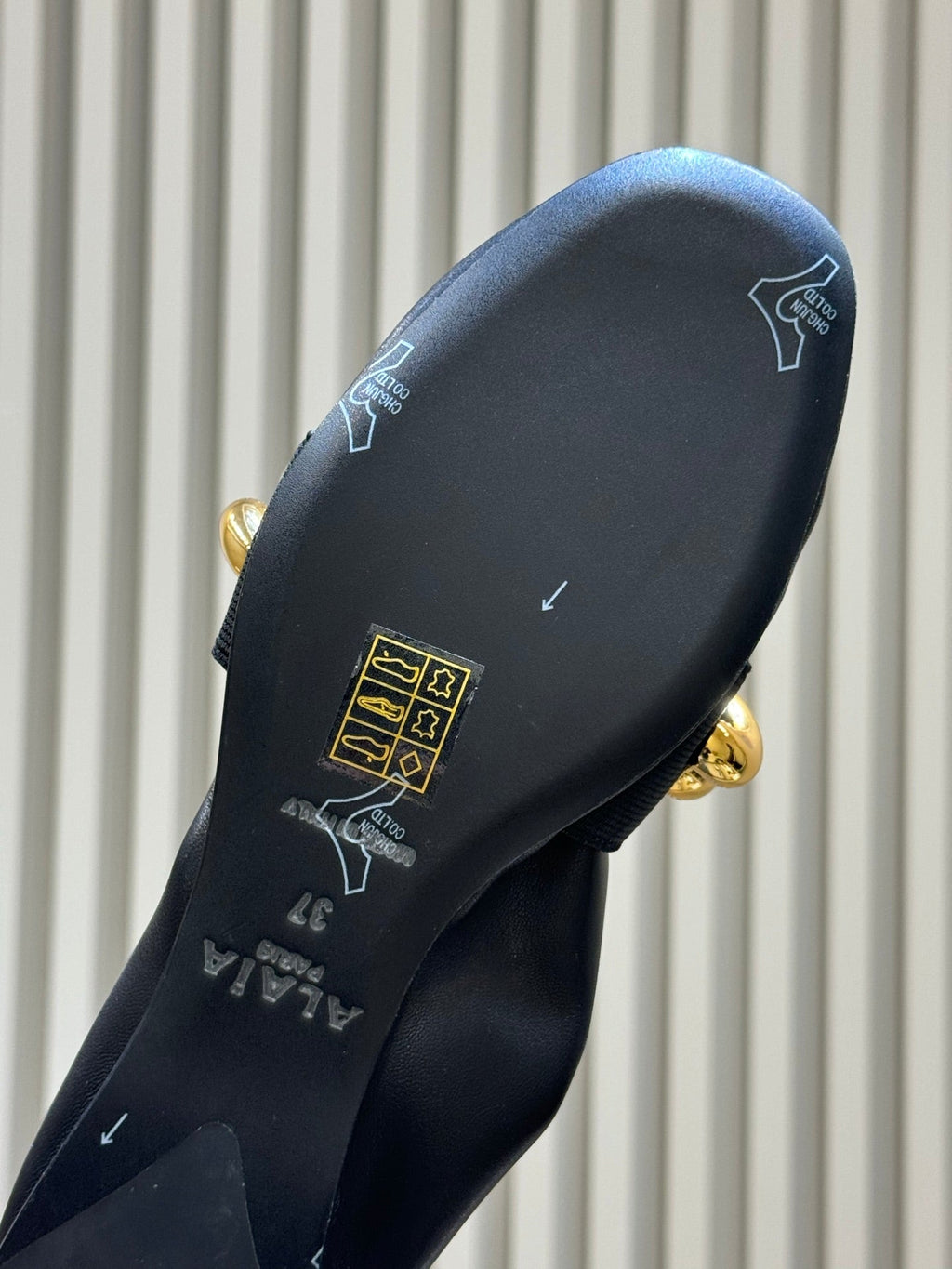 ALAIA 26S KNIT BALLET FLATS IN BLACK LAMBSKIN WITH GOLD HARDWARE