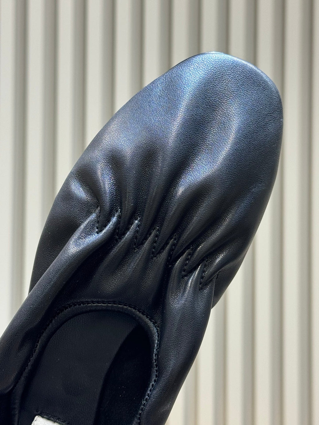ALAIA 26S KNIT BALLET FLATS IN BLACK LAMBSKIN