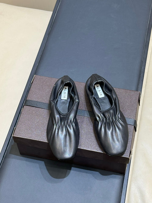 ALAIA 26S KNIT BALLET FLATS IN BLACK LAMBSKIN