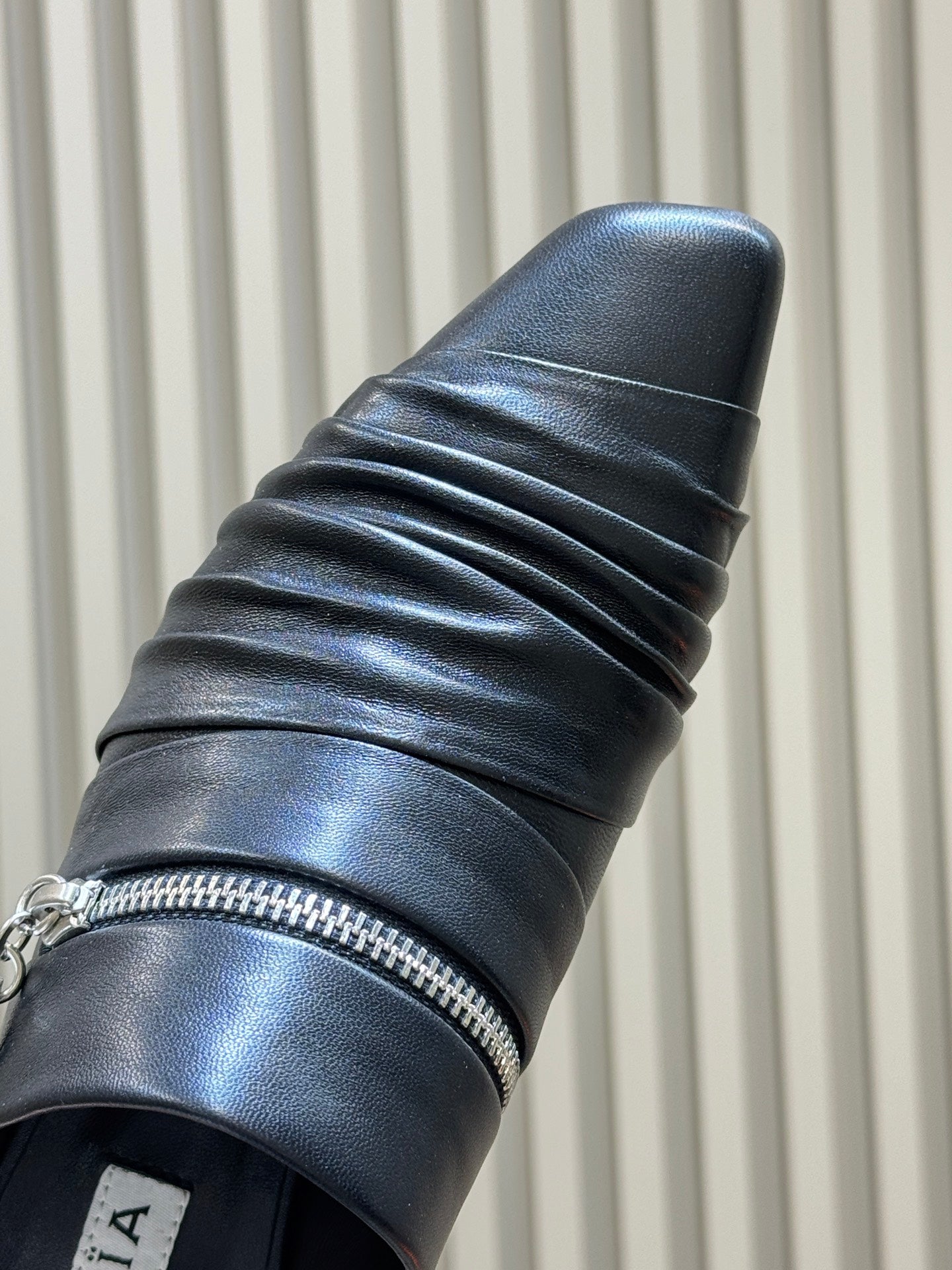ALAIA 26S PLEATED MULES IN BLACK LAMBSKIN