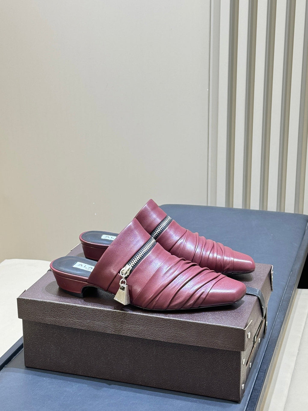 ALAIA 26S PLEATED MULES IN DARK RED LAMBSKIN