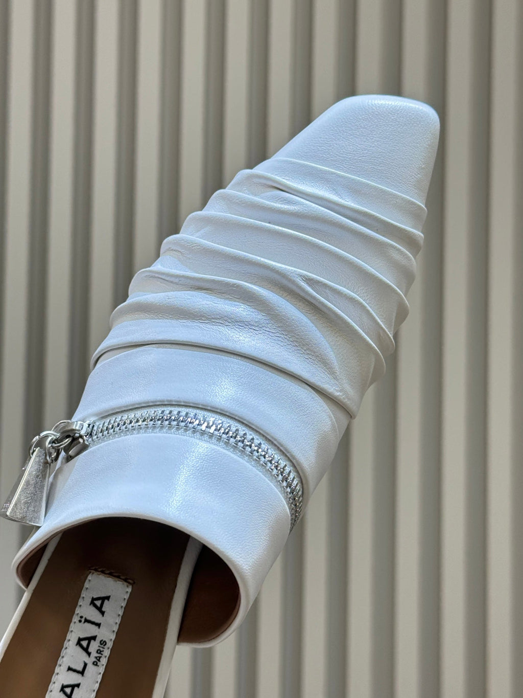 ALAIA 26S PLEATED MULES IN WHITE LAMBSKIN