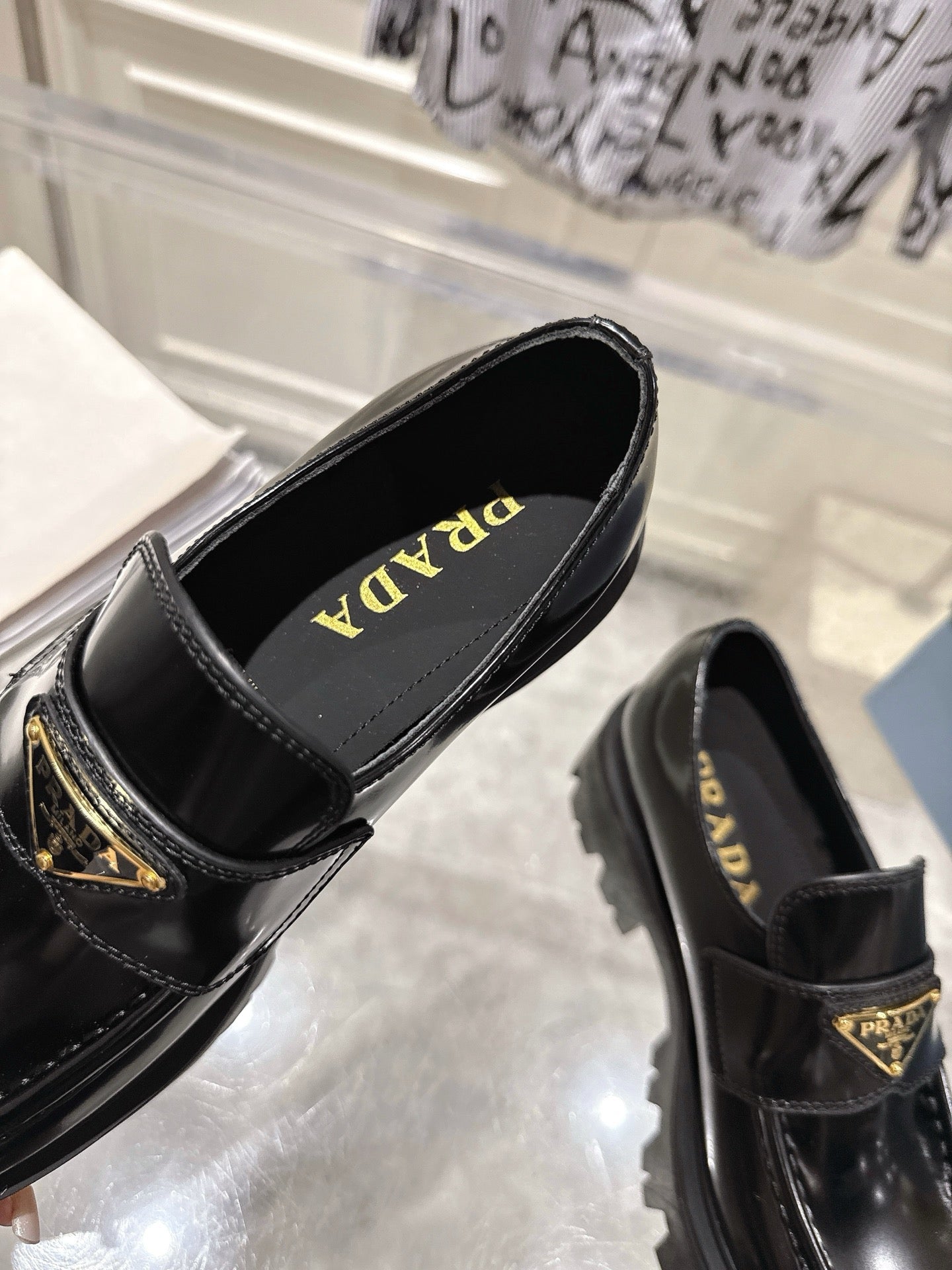PRADA 26S PLATFORM LOAFERS 45MM IN BLACK SHINE CALFSKIN