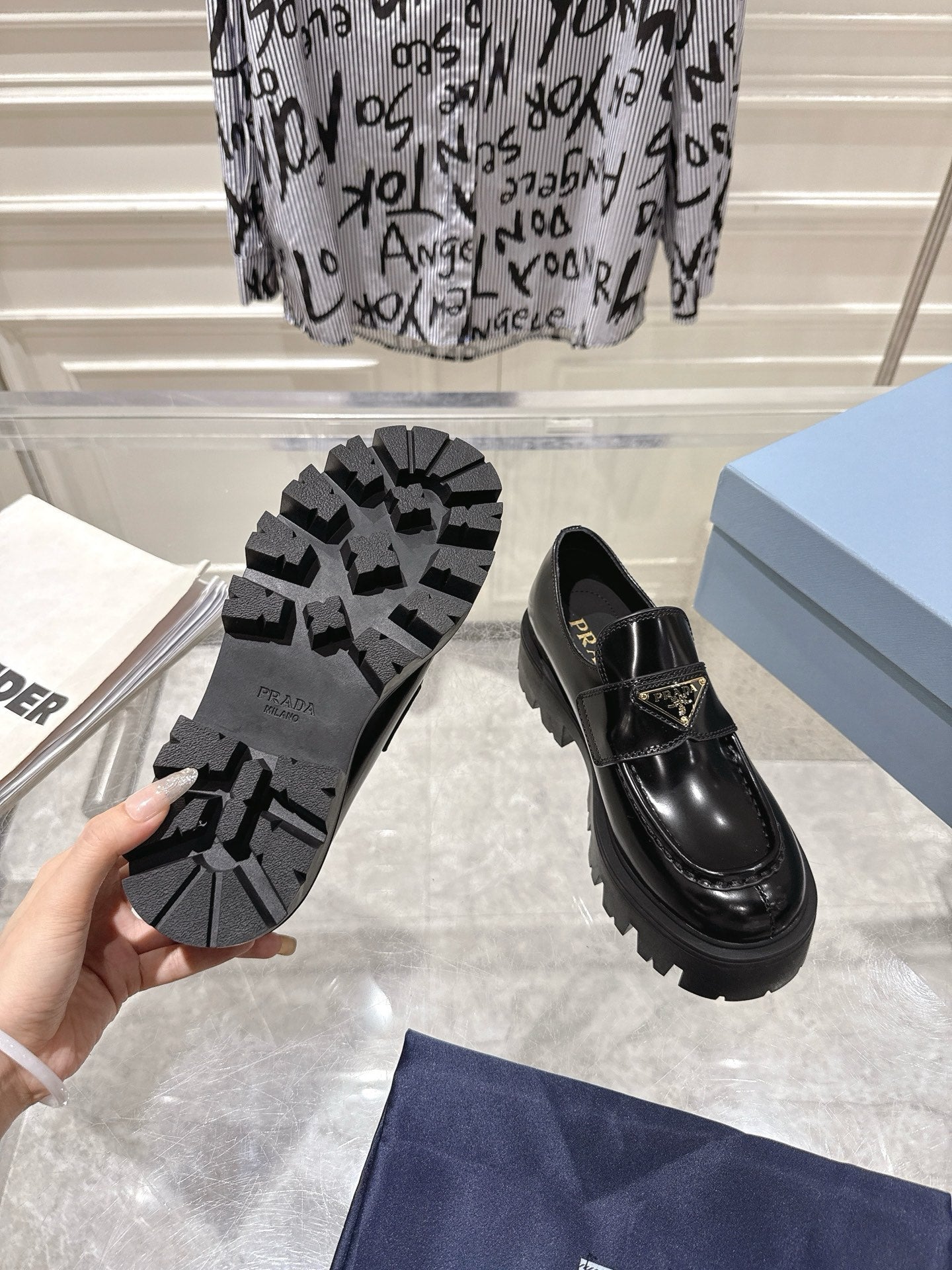 PRADA 26S PLATFORM LOAFERS 45MM IN BLACK SHINE CALFSKIN