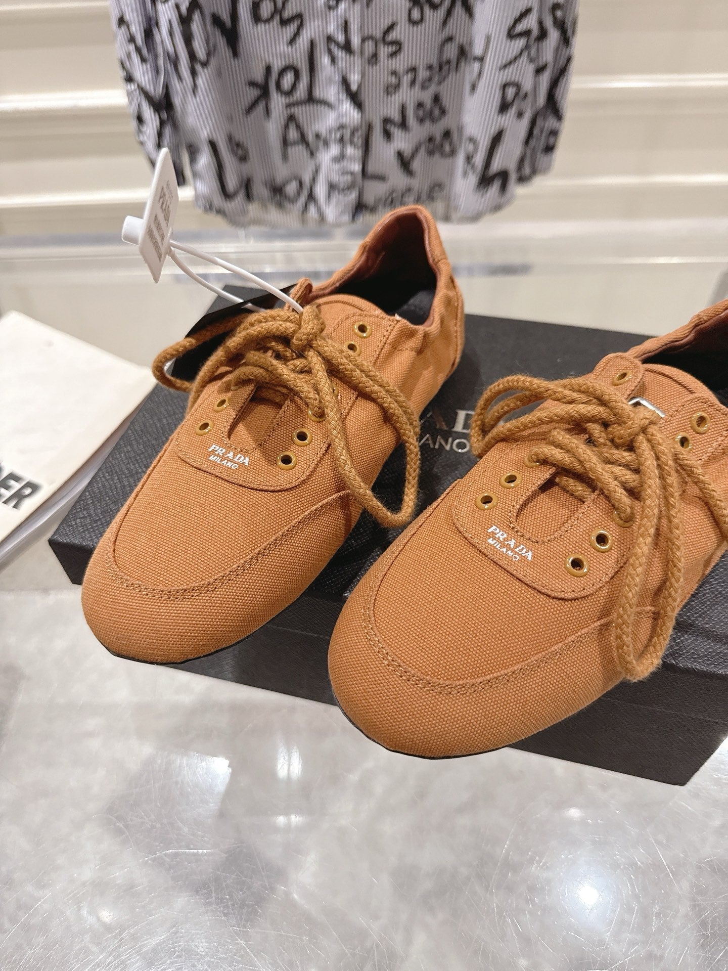 PRADA 26S COLLAPSE SNEAKERS IN CARAMEL BROWN CANVAS