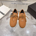 PRADA 26S COLLAPSE SNEAKERS IN CARAMEL BROWN CANVAS