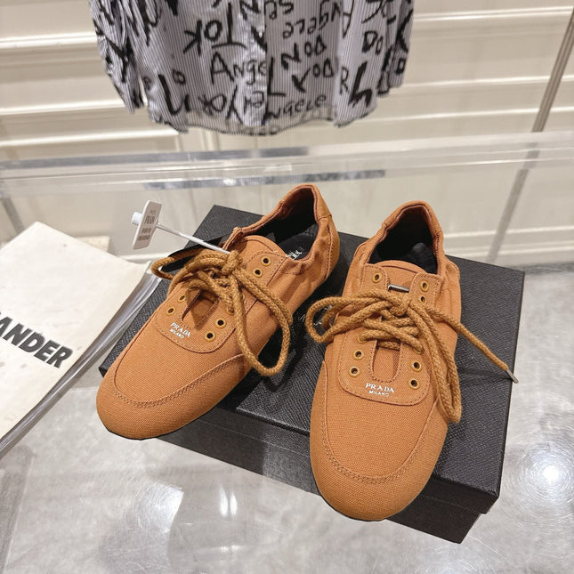 PRADA 26S COLLAPSE SNEAKERS IN CARAMEL BROWN CANVAS