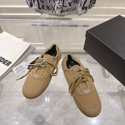 PRADA 26S COLLAPSE SNEAKERS IN BROWN CANVAS
