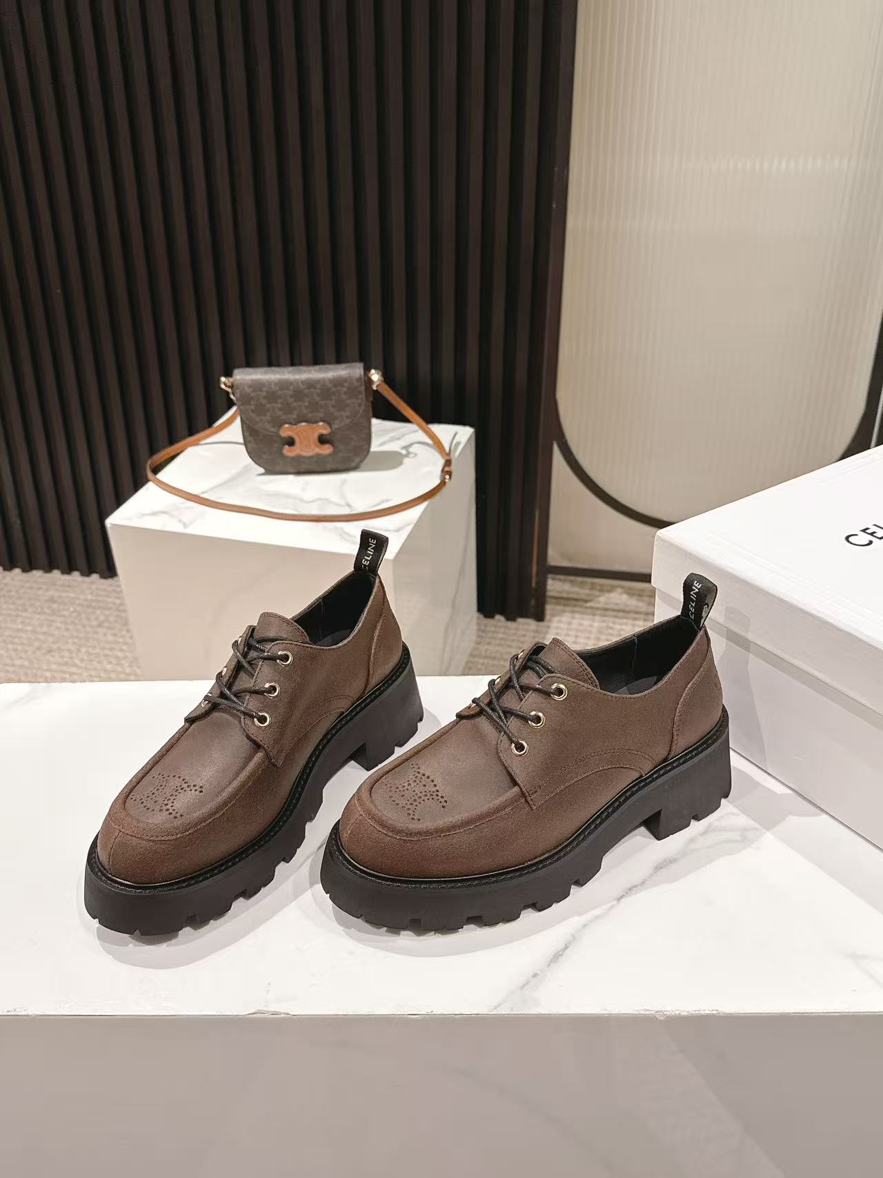 CELINE 25S THICK SOLED LOAFERS 50MM IN BROWN CALFSKIN