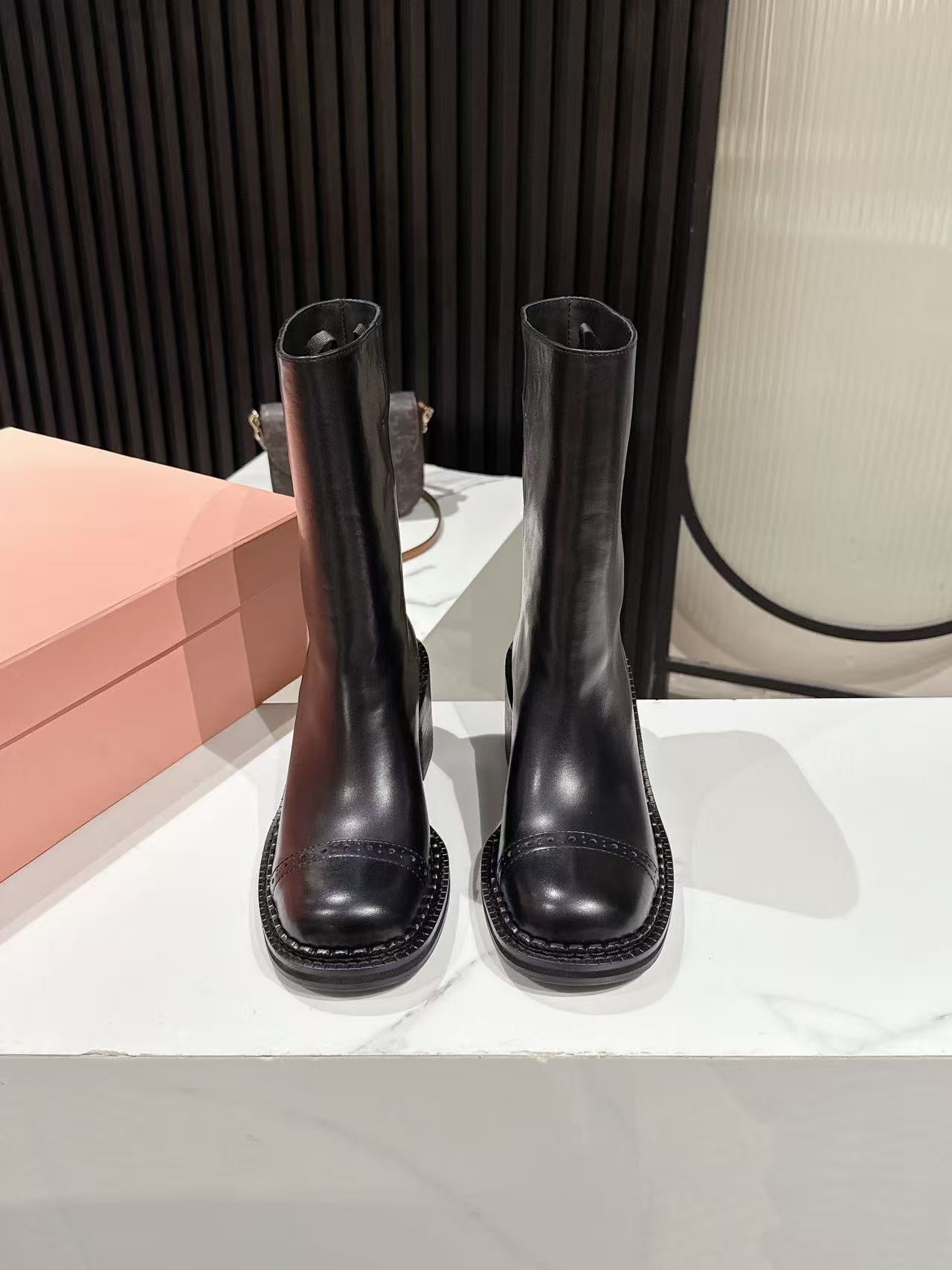 MIUMIU 26S PLATFORM HIGH-HEEL BOOTS 50MM IN BLACK GLOSSY CALFSKIN