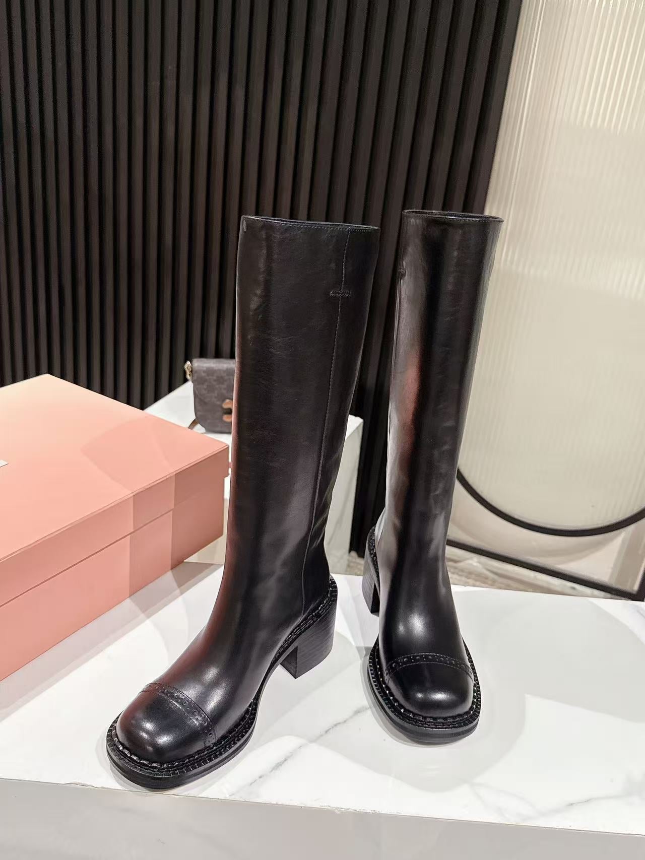 MIUMIU 26S HIGH-ANKLE BOOTS 50MM IN BLACK GLOSSY CALFSKIN