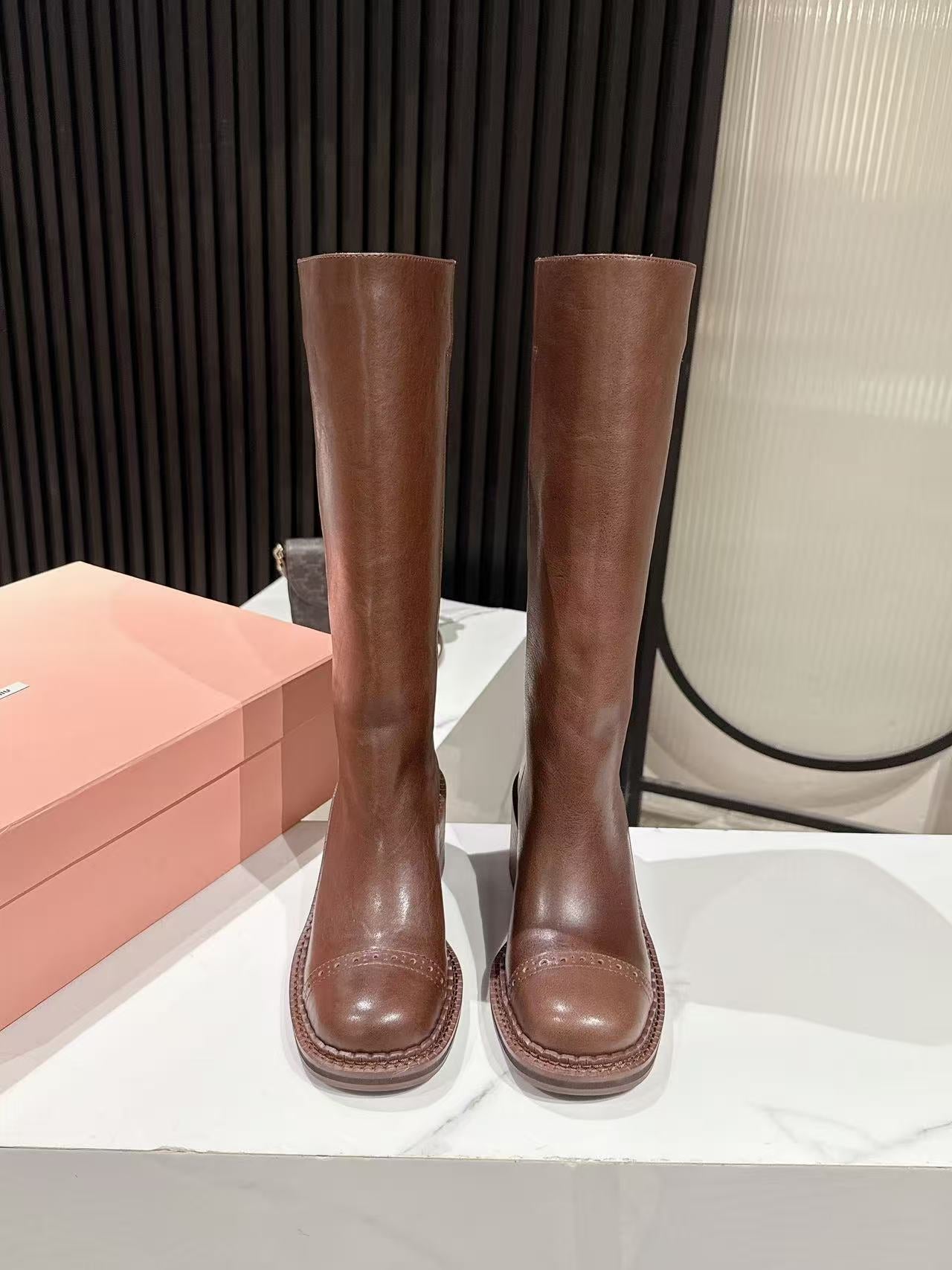 MIUMIU 26S HIGH-ANKLE BOOTS 50MM IN BROWN GLOSSY CALFSKIN