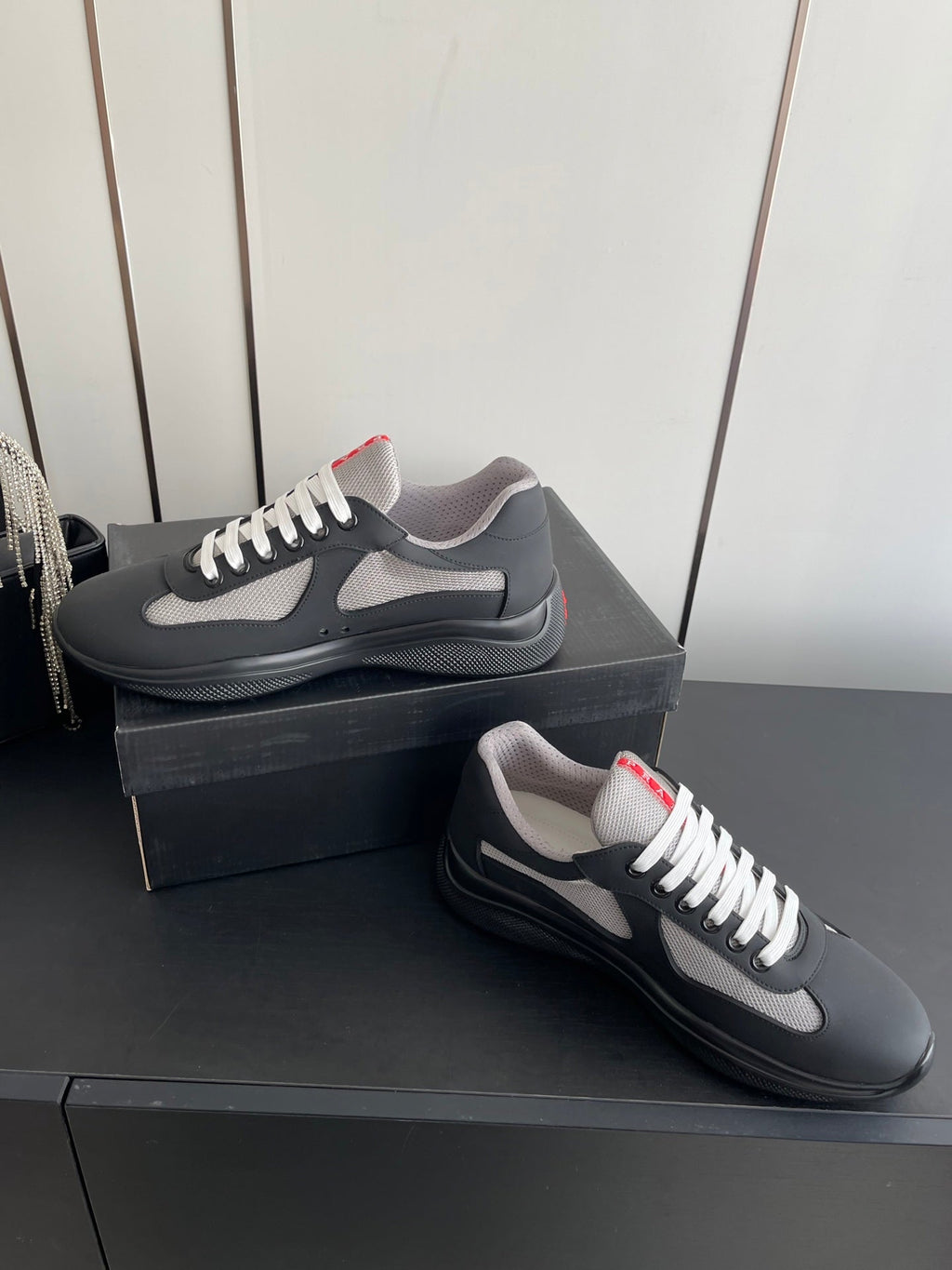 PRADA 26S AMERICA CUP SNEAKERS IN BLACK SOFT RUBBER AND BIKE FABRIC