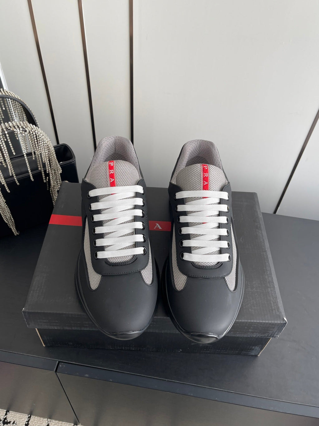 PRADA 26S AMERICA CUP SNEAKERS IN BLACK SOFT RUBBER AND BIKE FABRIC