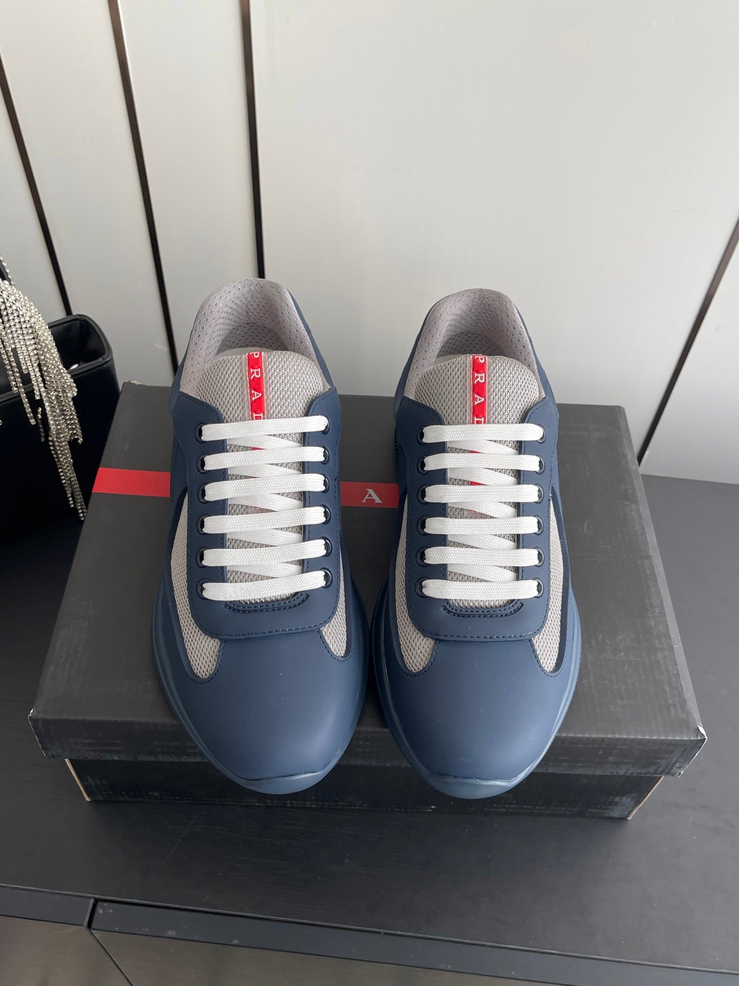 PRADA 26S AMERICA CUP SNEAKERS IN SLATE BLUE SOFT RUBBER AND BIKE FABRIC