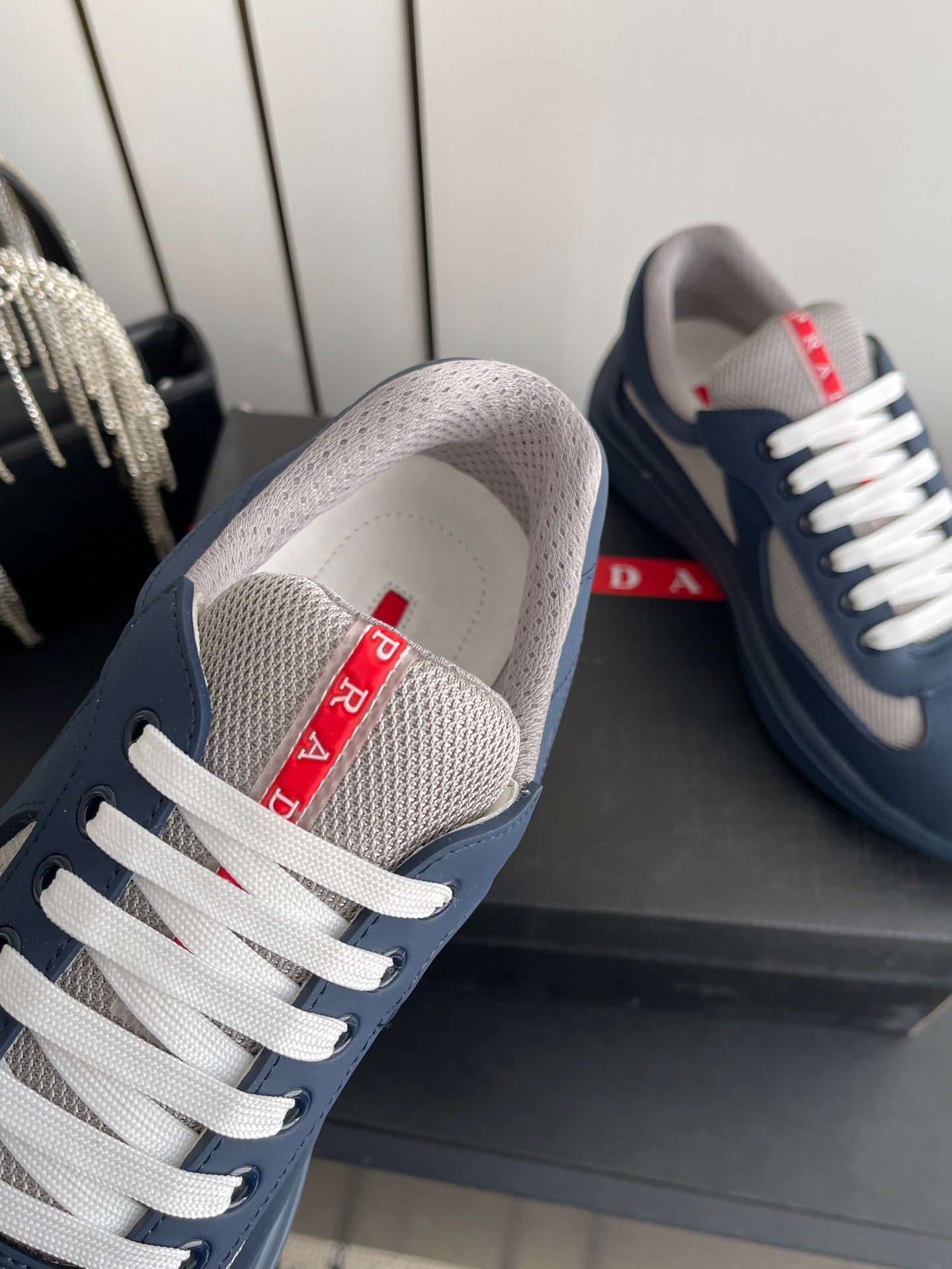 PRADA 26S AMERICA CUP SNEAKERS IN SLATE BLUE SOFT RUBBER AND BIKE FABRIC