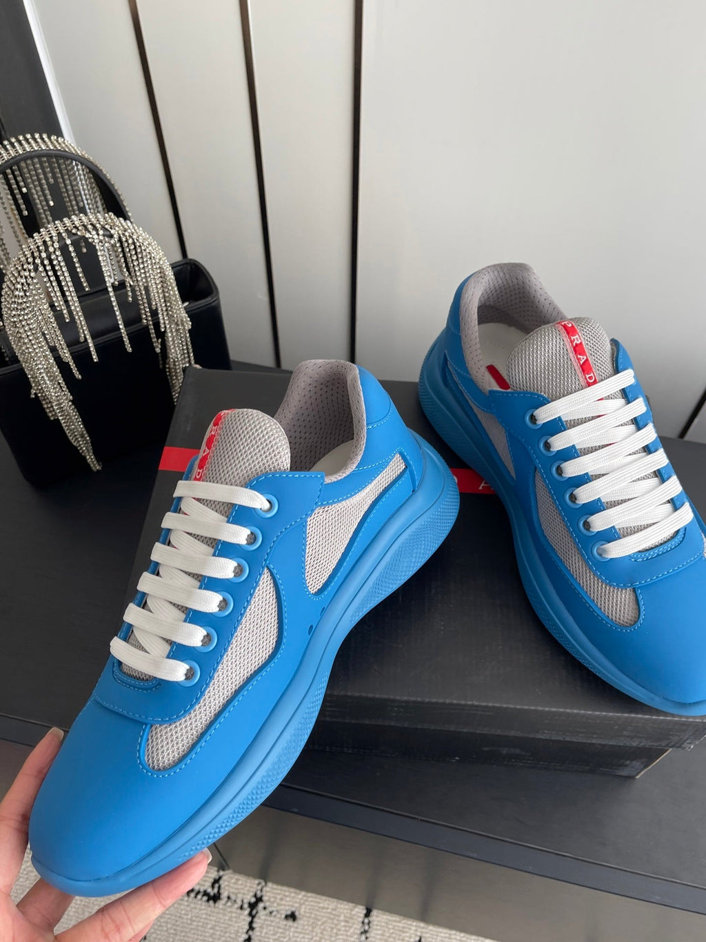 PRADA 26S AMERICA CUP SNEAKERS IN AZURE BLUE SOFT RUBBER AND BIKE FABRIC