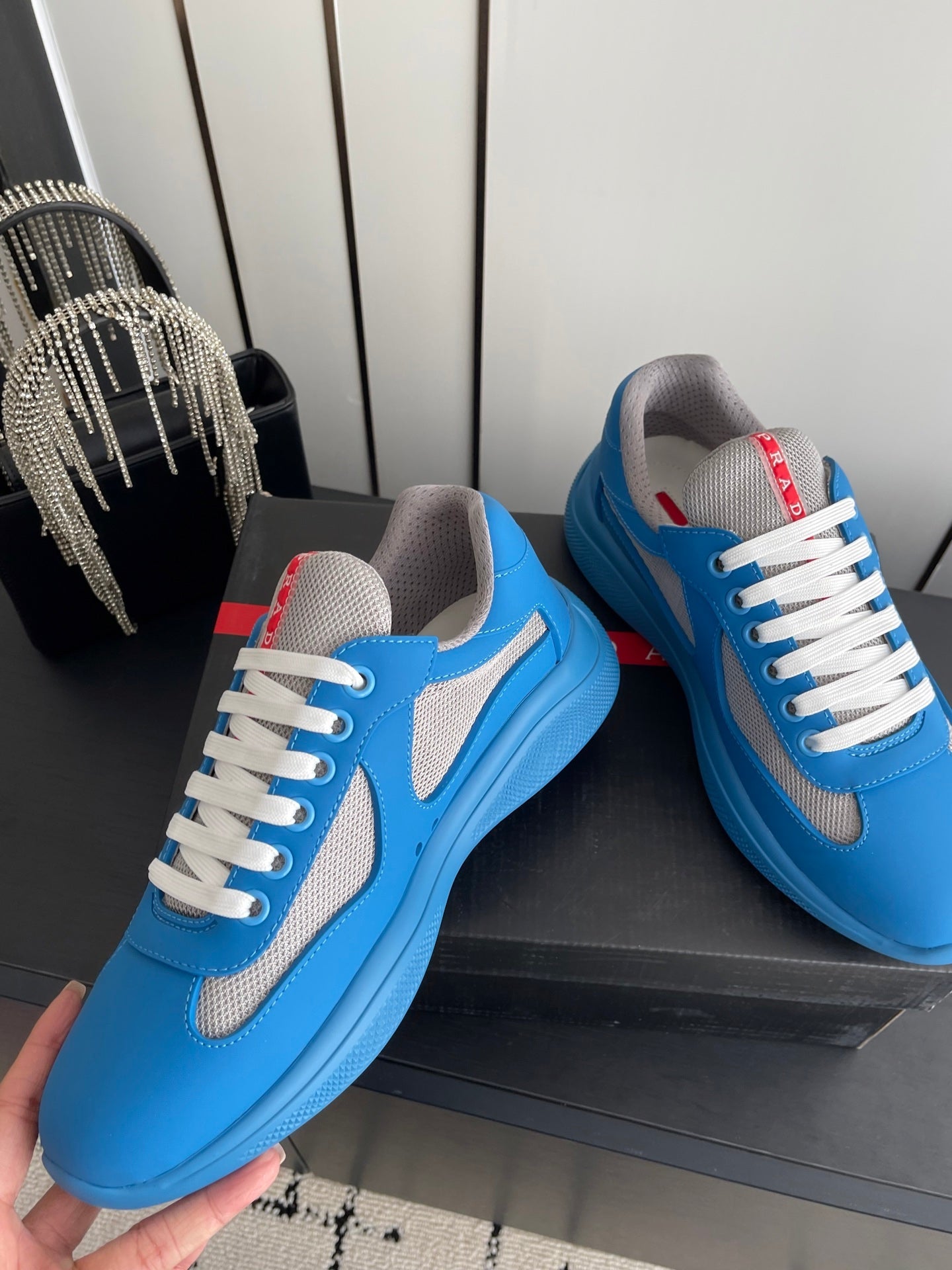PRADA 26S AMERICA CUP SNEAKERS IN AZURE BLUE SOFT RUBBER AND BIKE FABRIC