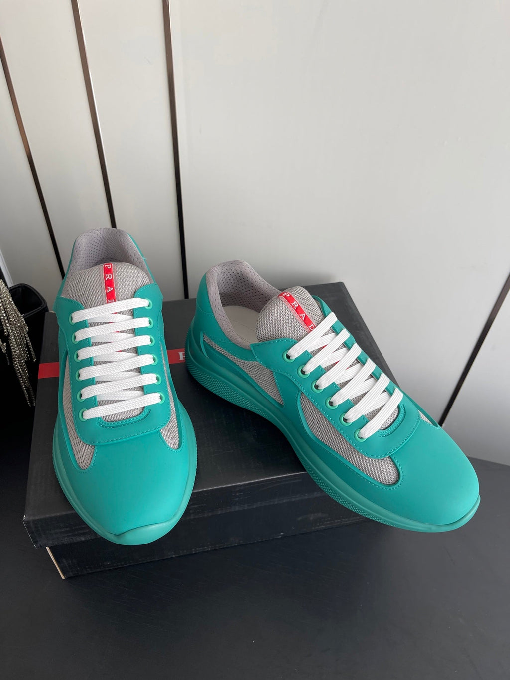 PRADA 26S AMERICA CUP SNEAKERS IN TEAL BLUE SOFT RUBBER AND BIKE FABRIC
