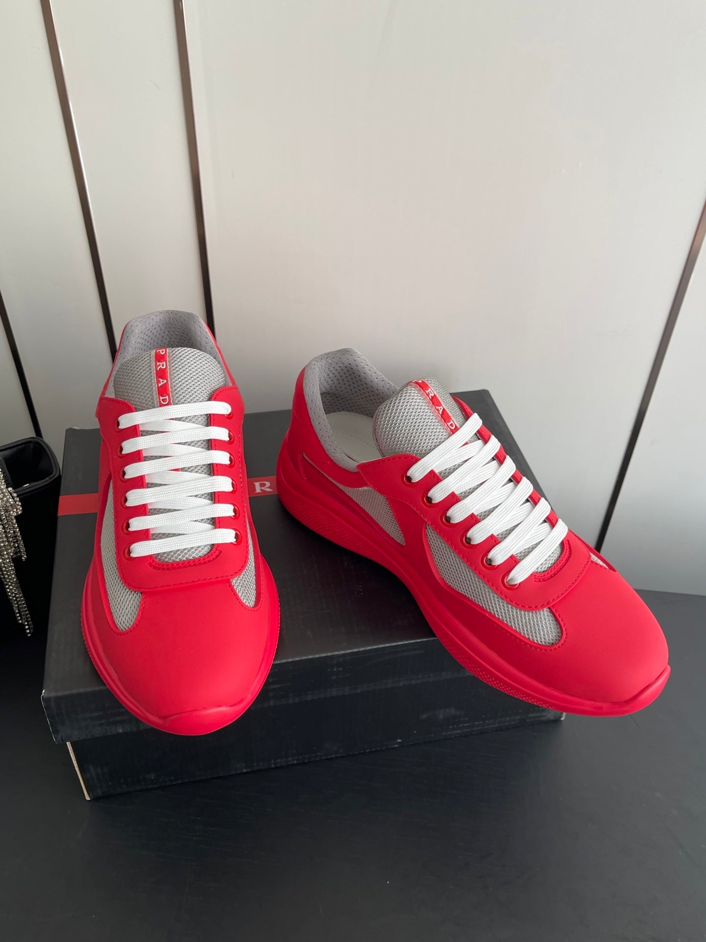 PRADA 26S AMERICA CUP SNEAKERS IN RED SOFT RUBBER AND BIKE FABRIC