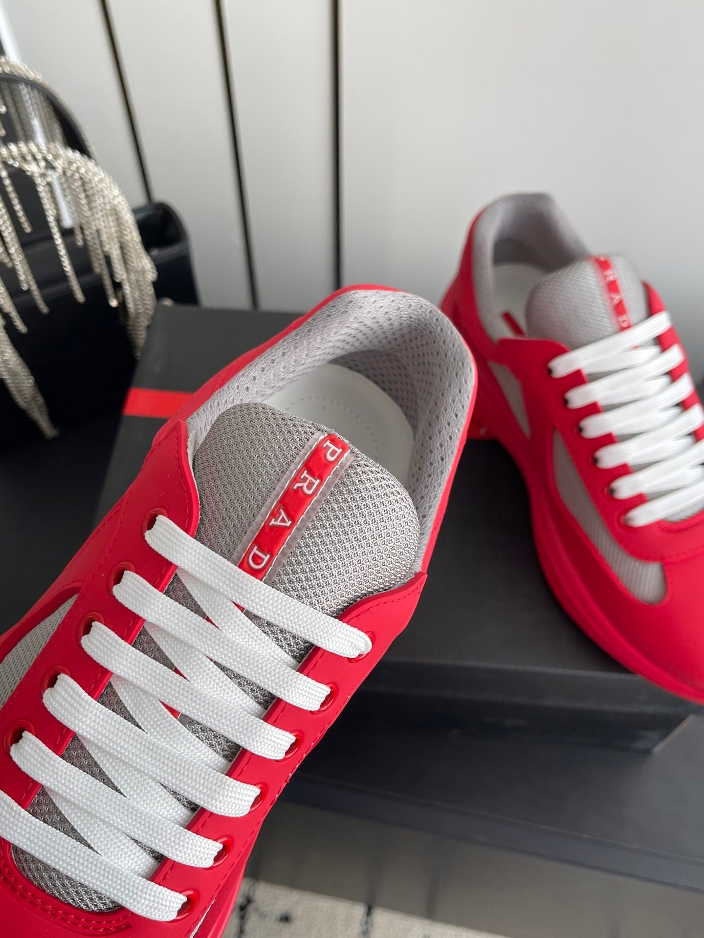 PRADA 26S AMERICA CUP SNEAKERS IN RED SOFT RUBBER AND BIKE FABRIC