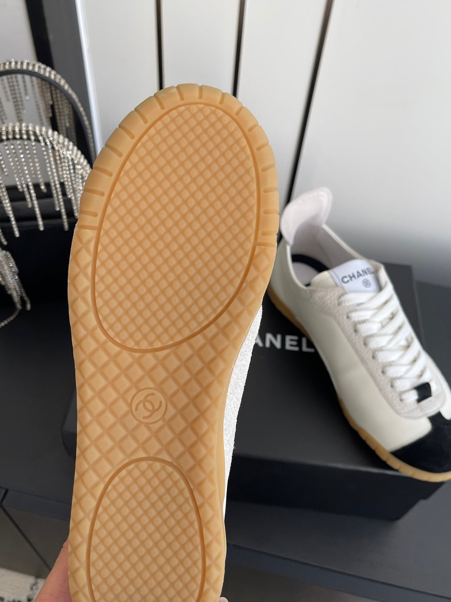 CHANEL LOW-TOP SNEAKERS IN BLACK AND WHITE CALFSKIN MIX SUEDE