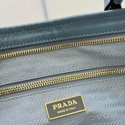 PRADA 25S LUX SOFT BAG 42 IN BLUE GLOSSY CALFSKIN GOLD HARDWARE