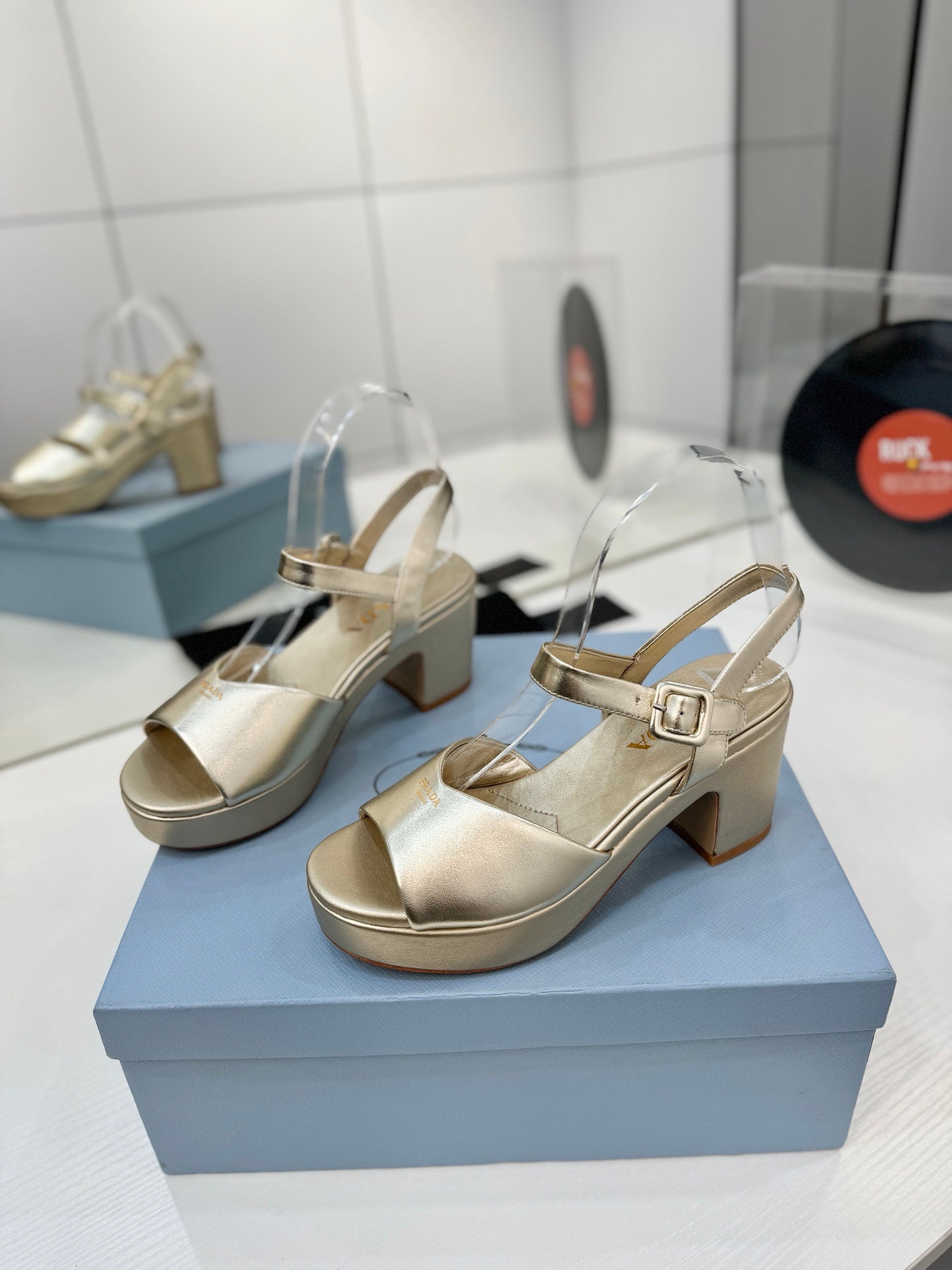 PRADA 26S HEELED SANDALS 70MM IN GOLD CALFSKIN