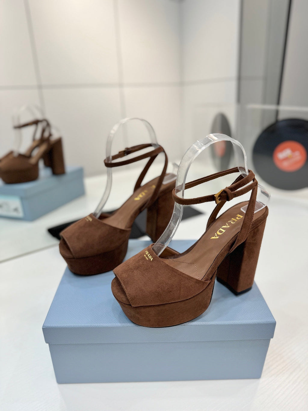 PRADA 26S HEELED SANDALS 115MM IN DARK BROWN SUEDE