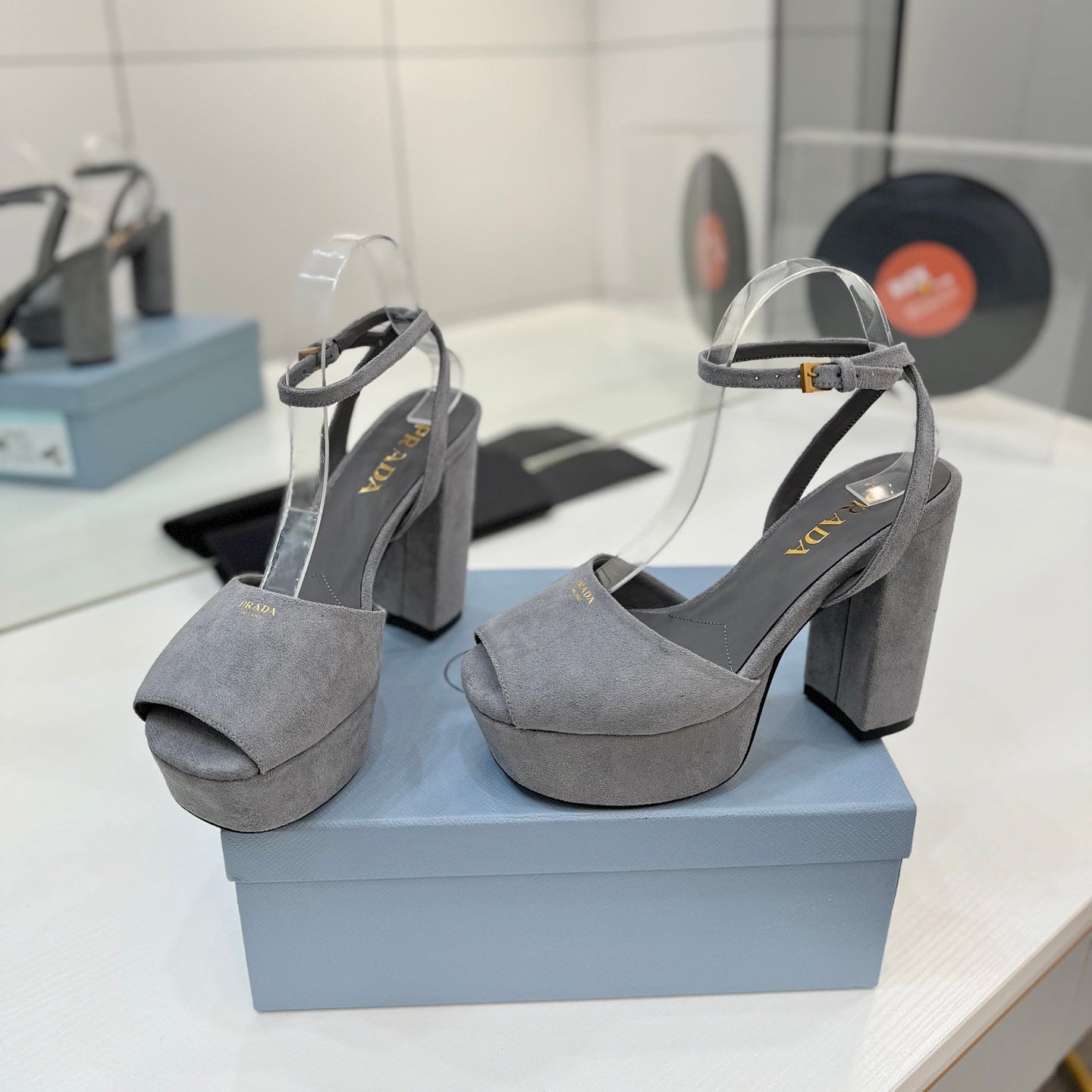PRADA 26S HEELED SANDALS 115MM IN GRAY SUEDE