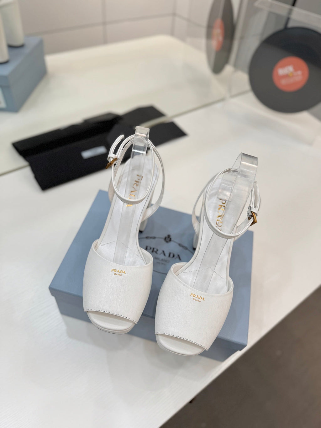 PRADA 26S HEELED SANDALS 115MM IN WHITE CALFSKIN