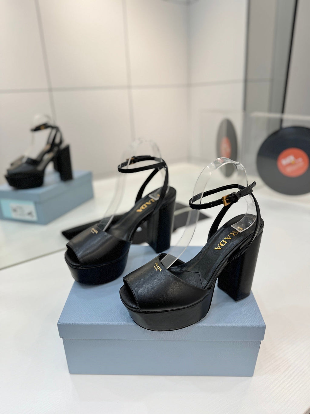 PRADA 26S HEELED SANDALS 115MM IN BLACK CALFSKIN