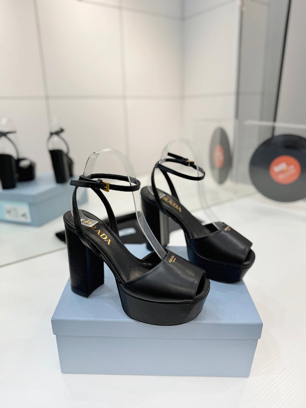 PRADA 26S HEELED SANDALS 115MM IN BLACK CALFSKIN
