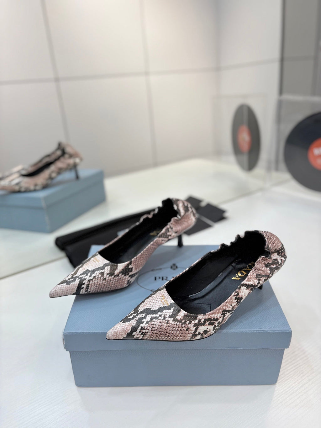 PRADA 26S PUMPS 55MM IN PINK SNAKE PRINT CALFSKIN