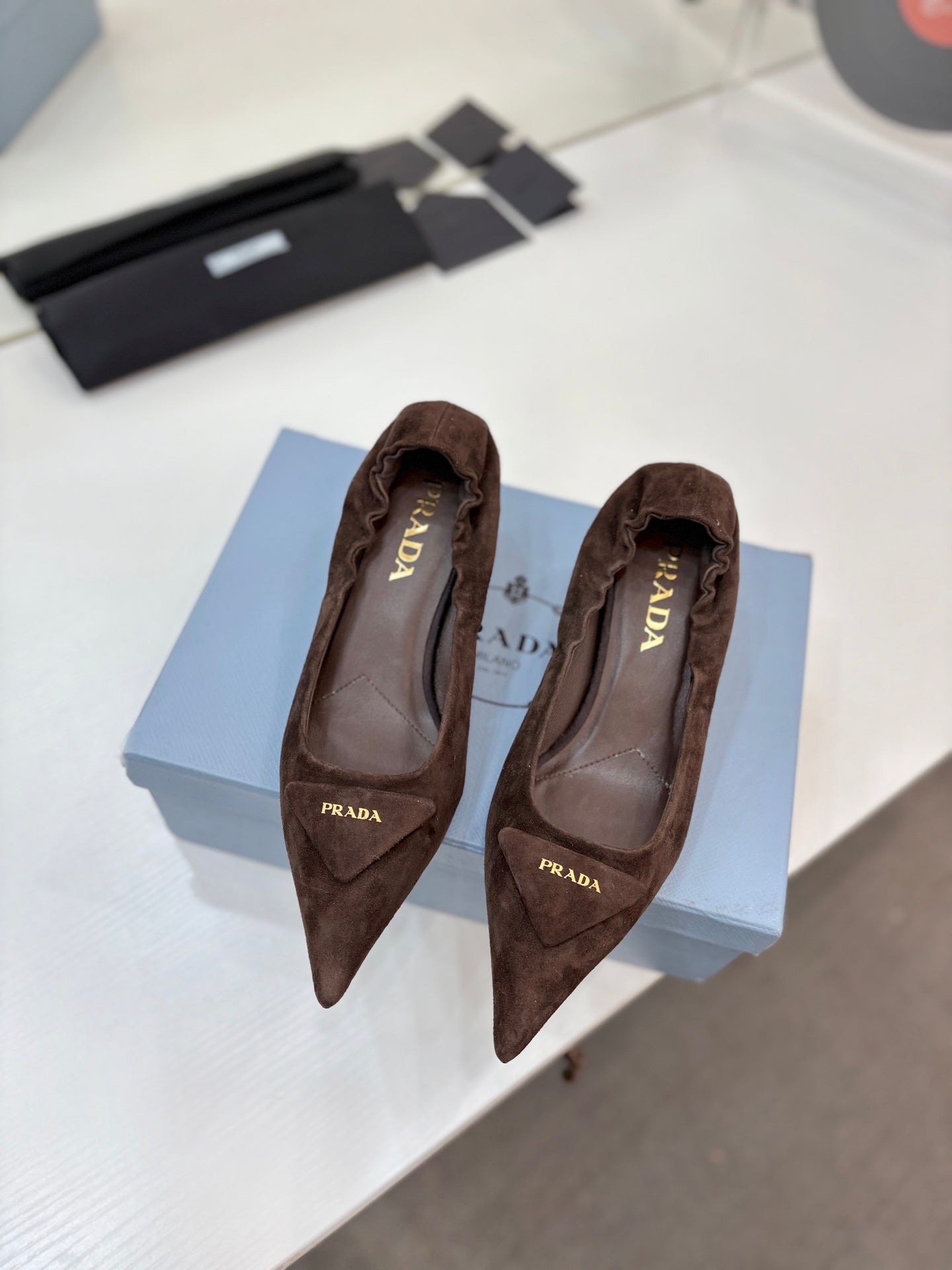 PRADA 26S PUMPS 55MM IN DARK BROWN SUEDE WITH LOGO