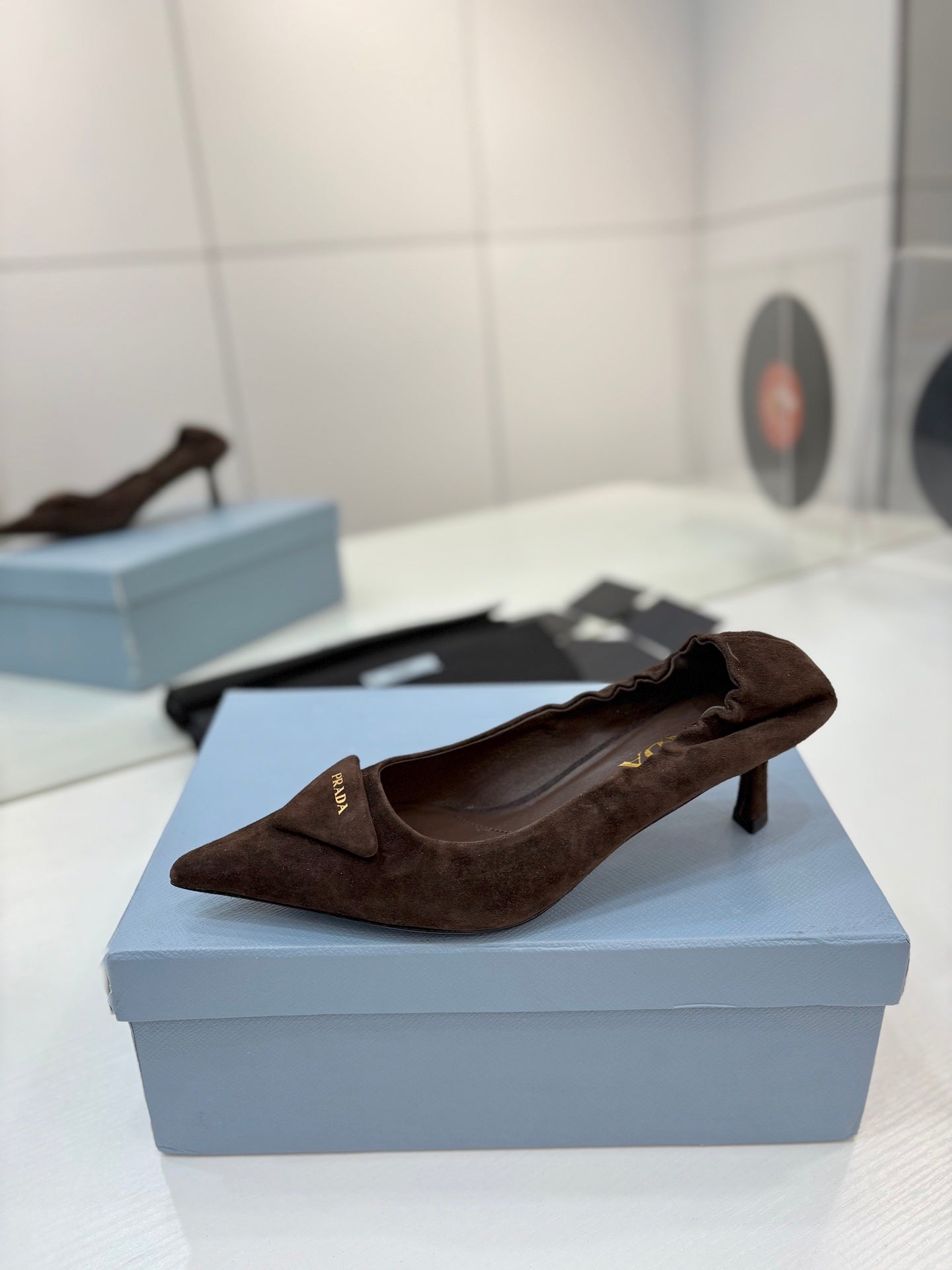 PRADA 26S PUMPS 55MM IN DARK BROWN SUEDE WITH LOGO