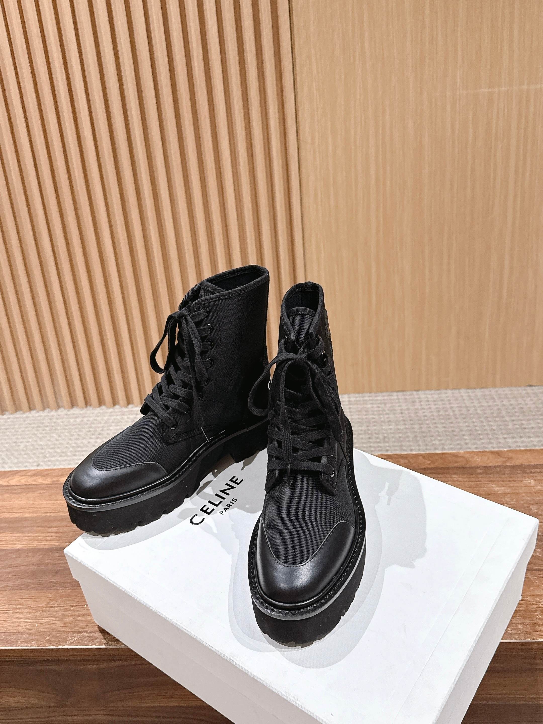 TRIOMPHE LACE-UP ANKLE BOOT IN BLACK CANVAS