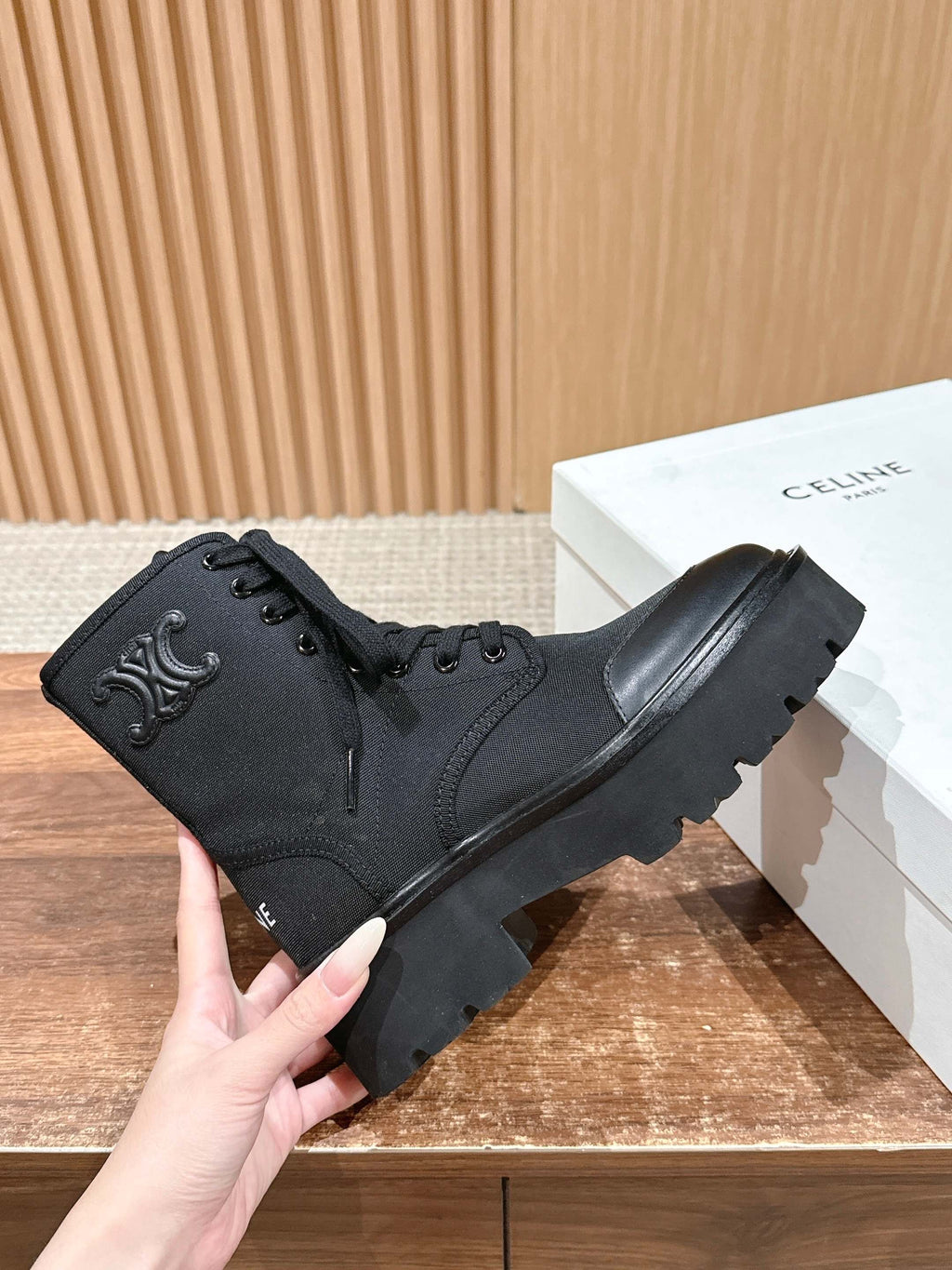TRIOMPHE LACE-UP ANKLE BOOT IN BLACK CANVAS