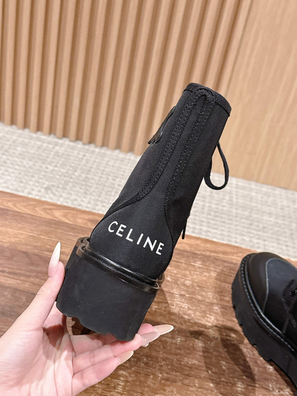 TRIOMPHE LACE-UP ANKLE BOOT IN BLACK CANVAS