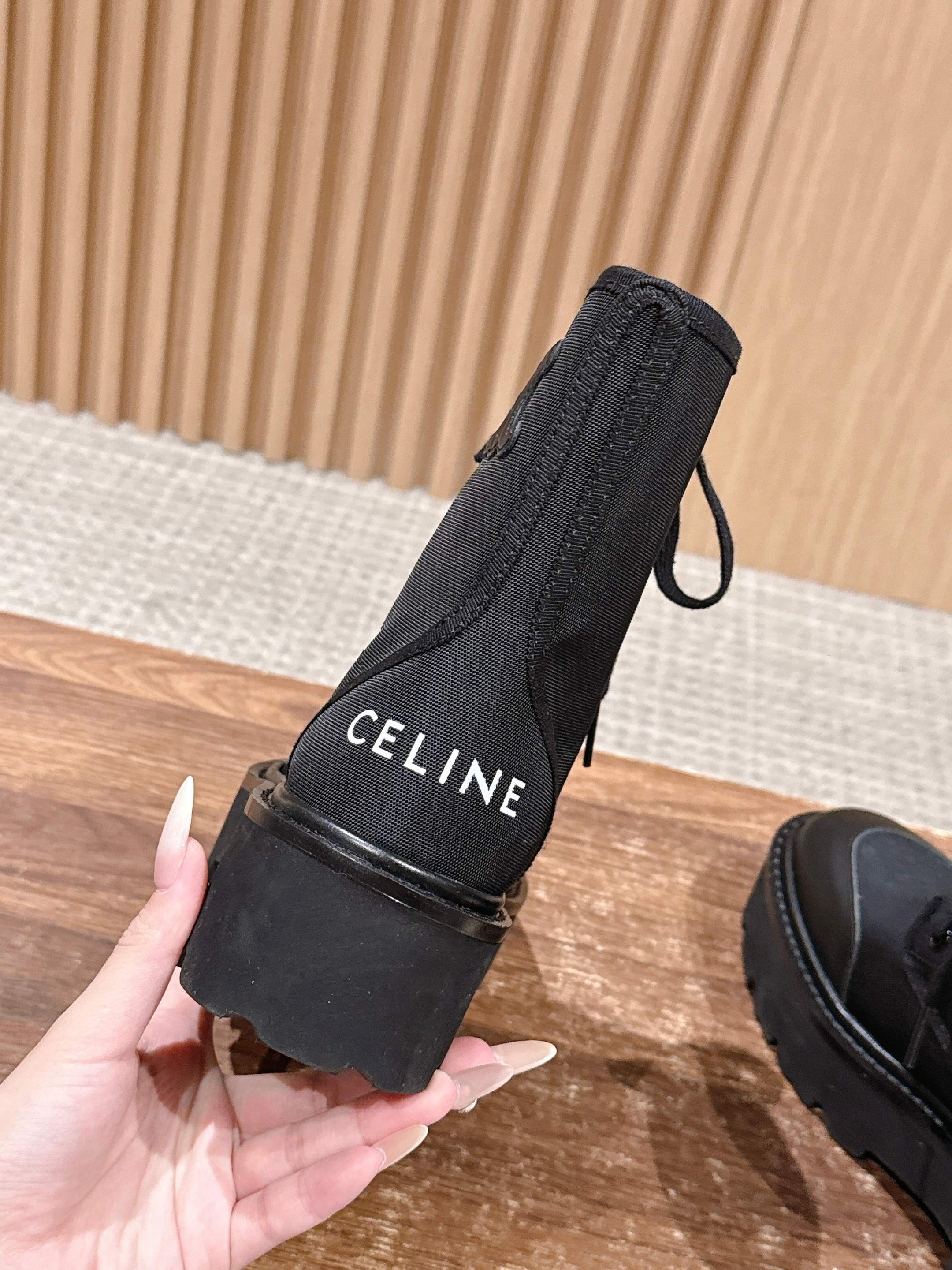 TRIOMPHE LACE-UP ANKLE BOOT IN BLACK CANVAS