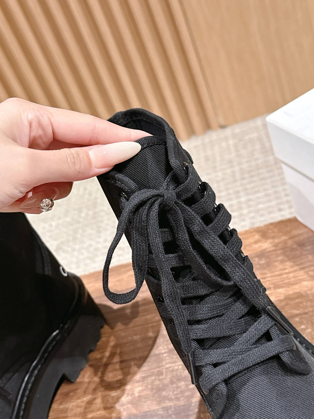 TRIOMPHE LACE-UP ANKLE BOOT IN BLACK CANVAS