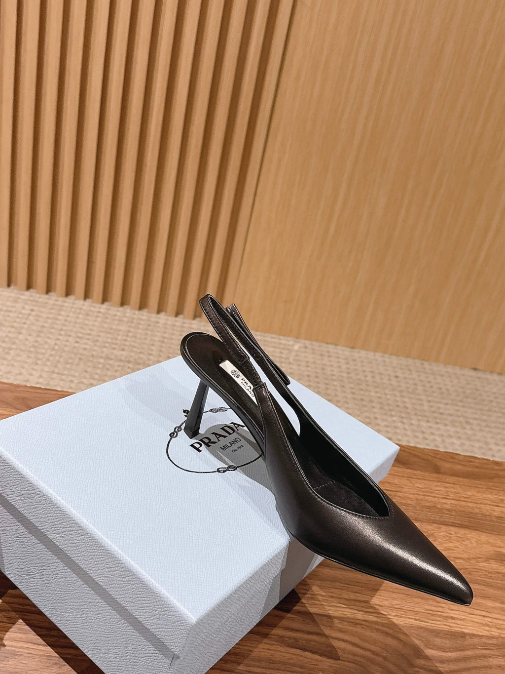 PRADA 26S SLINGBACK PUMPS IN BLACK CALFSKIN