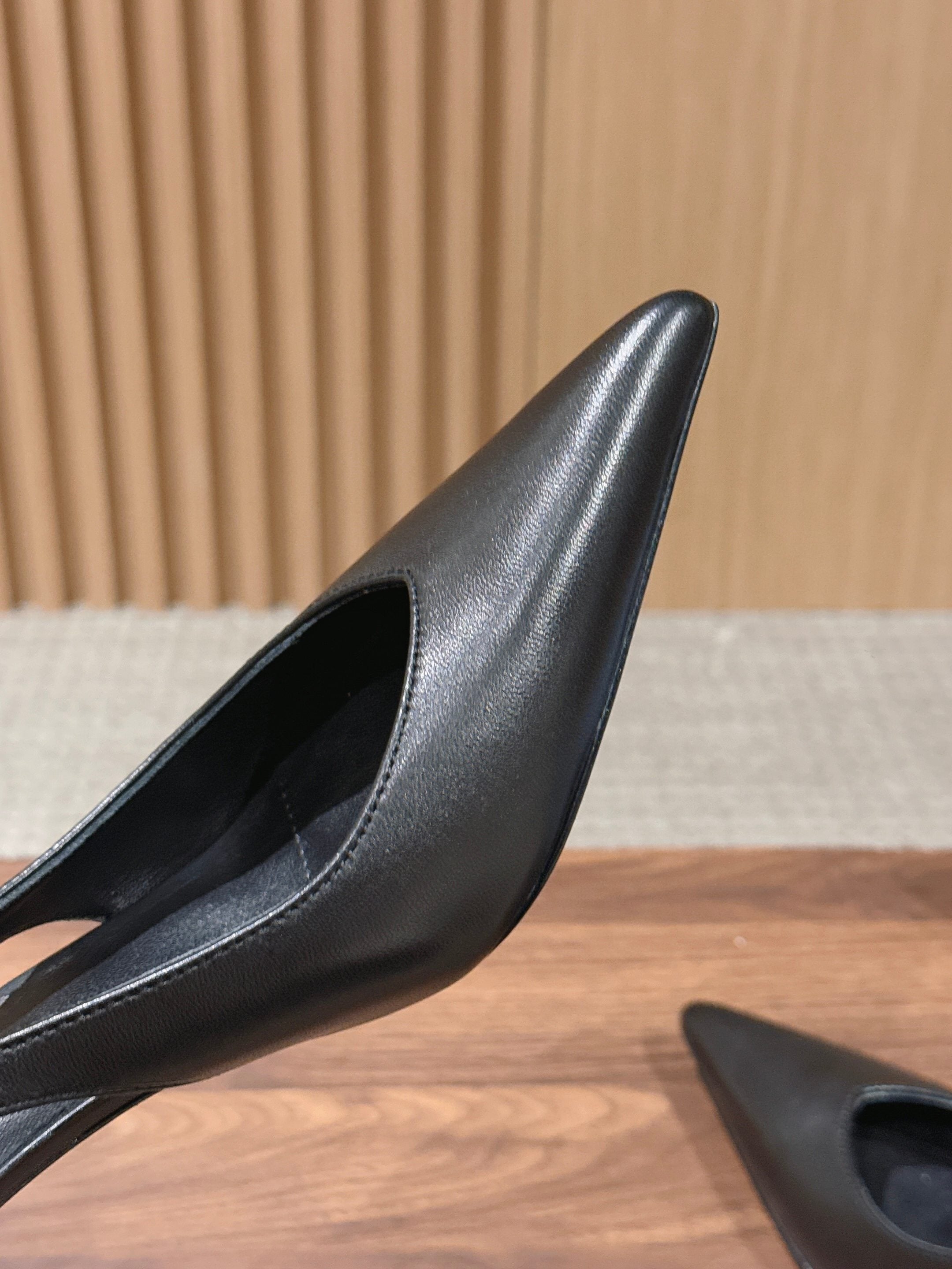 PRADA 26S SLINGBACK PUMPS IN BLACK CALFSKIN