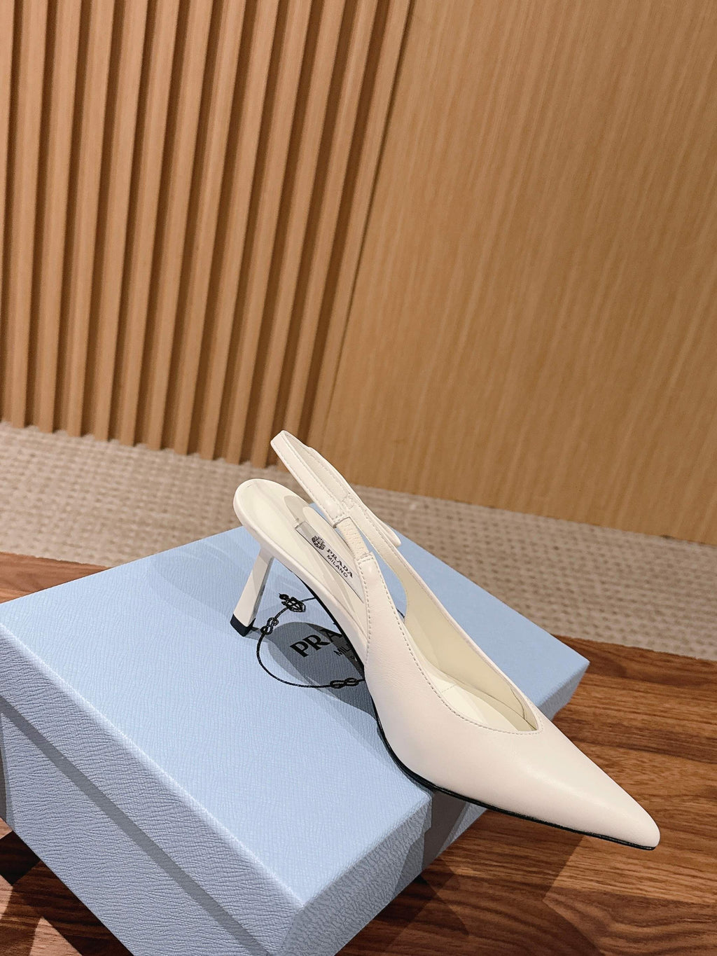 PRADA 26S SLINGBACK PUMPS IN WHITE CALFSKIN