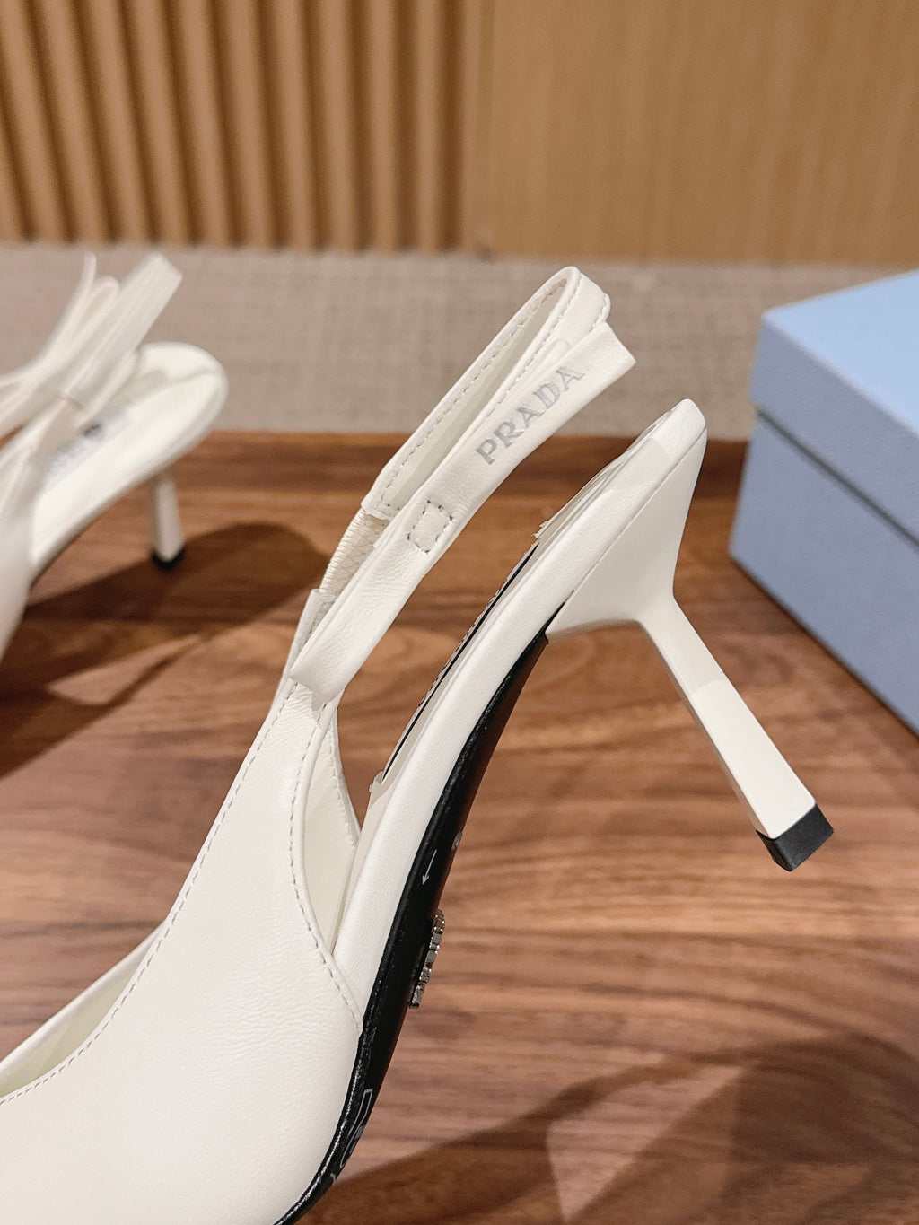PRADA 26S SLINGBACK PUMPS IN WHITE CALFSKIN