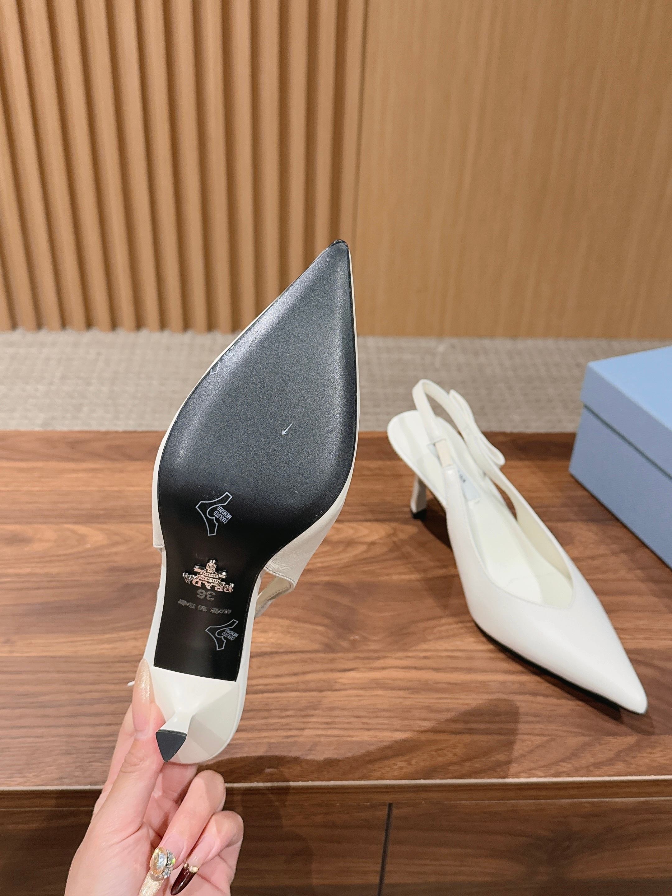 PRADA 26S SLINGBACK PUMPS IN WHITE CALFSKIN