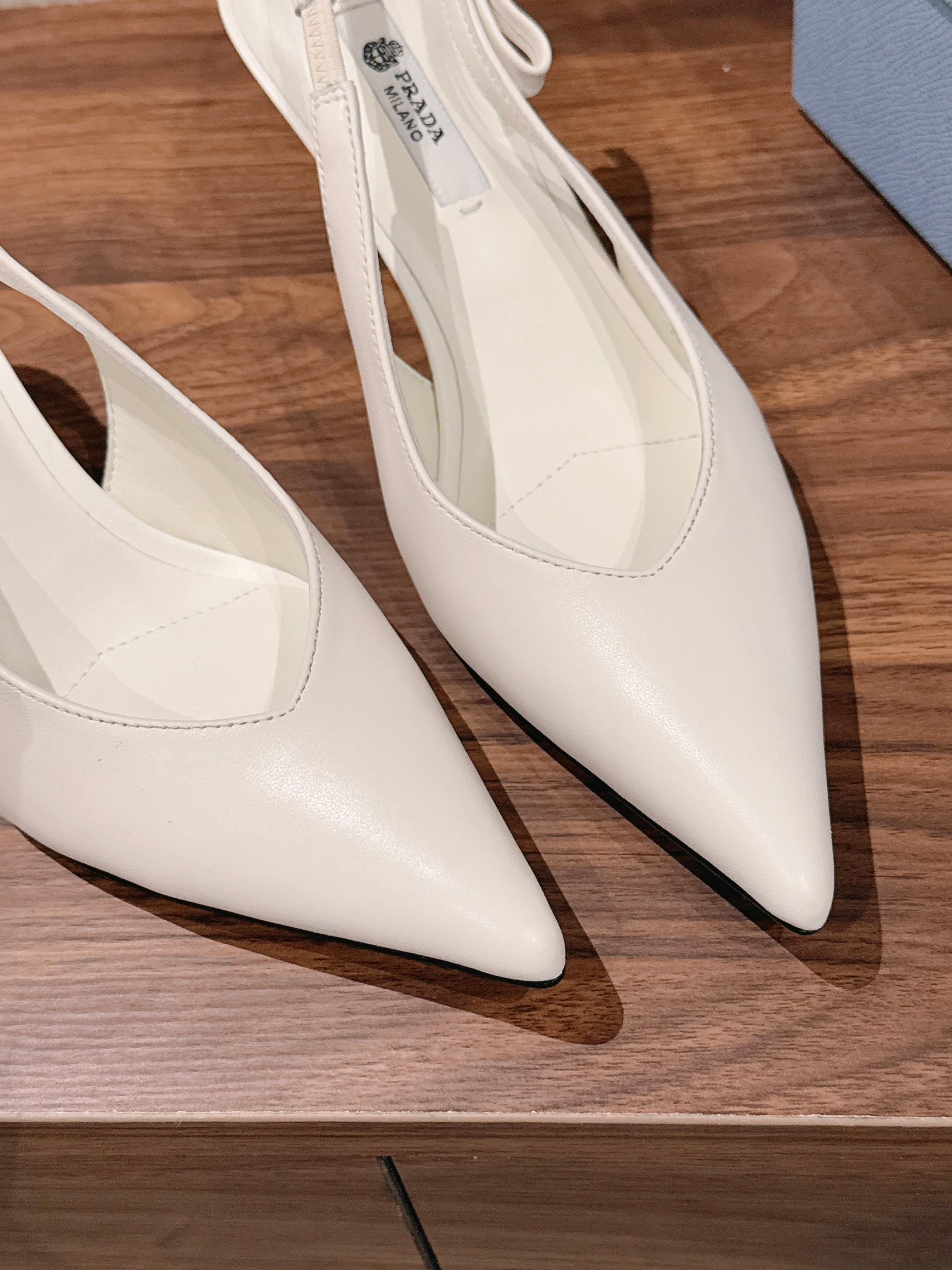 PRADA 26S SLINGBACK PUMPS IN WHITE CALFSKIN