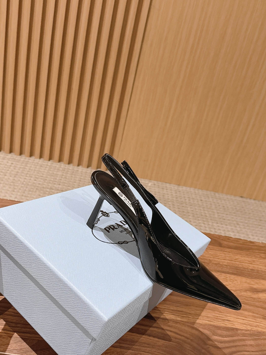 PRADA 26S SLINGBACK PUMPS IN BLACK PATENT CALFSKIN