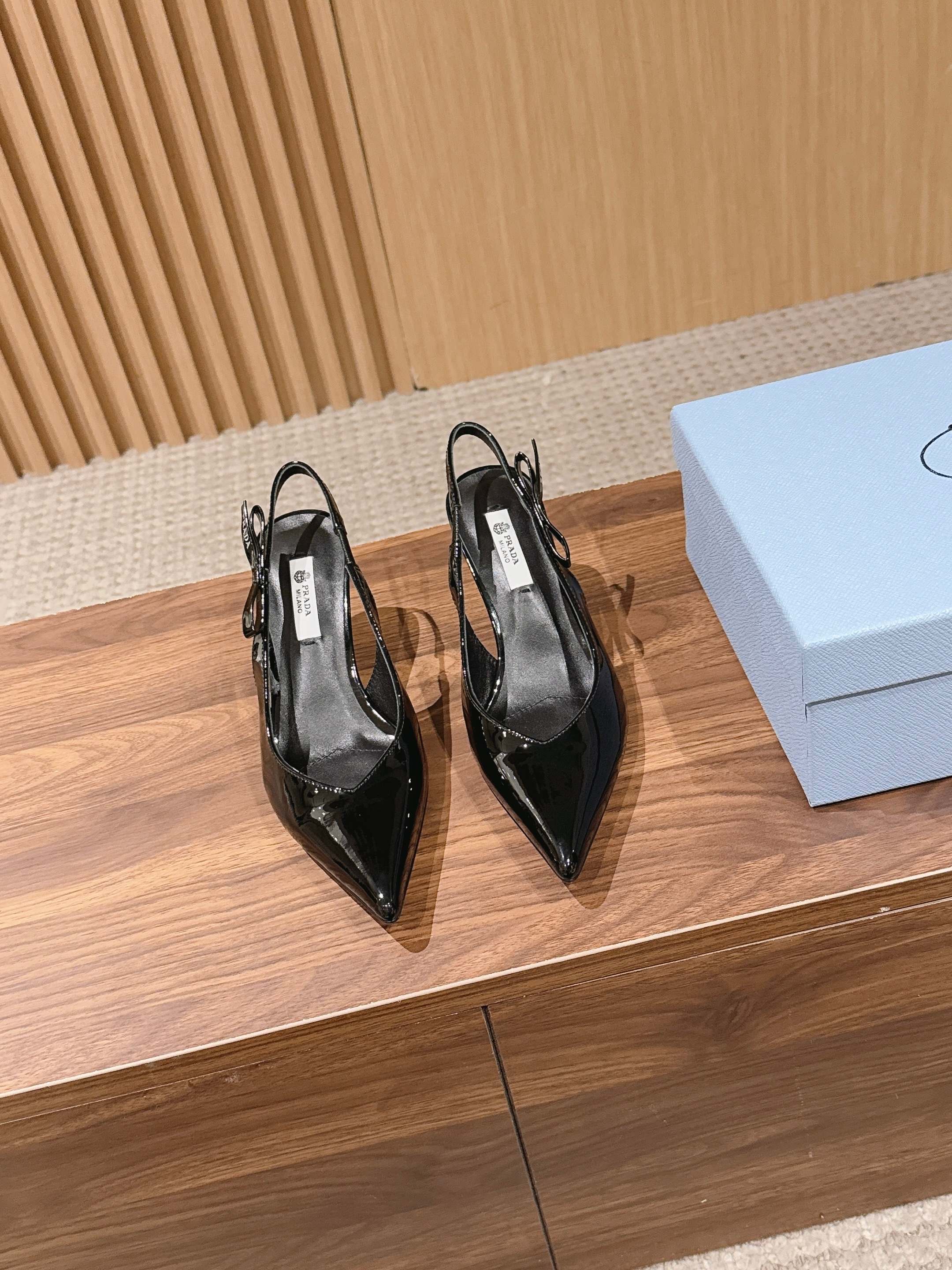 PRADA 26S SLINGBACK PUMPS IN BLACK PATENT CALFSKIN
