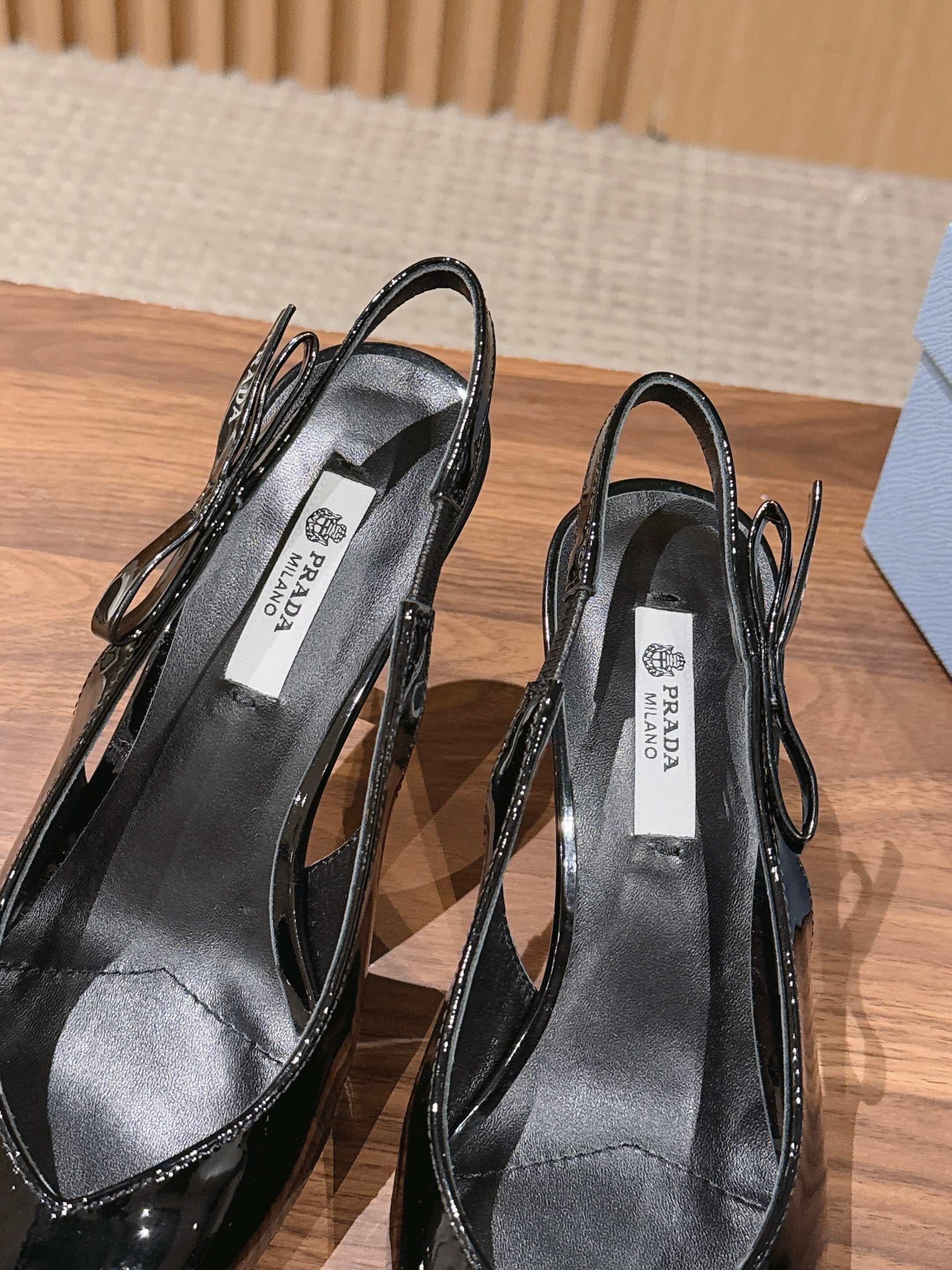 PRADA 26S SLINGBACK PUMPS IN BLACK PATENT CALFSKIN